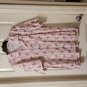 Columbia fishing shirt has palm trees and fish.